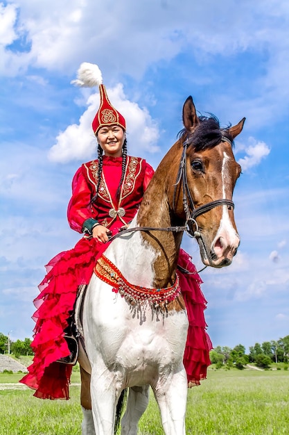 Shymkent Kazakhstan May 16 2018 A holiday at the city hippodrome in honor of the beginning of the Holy month of Ramadan Girls in national costumes on horseback