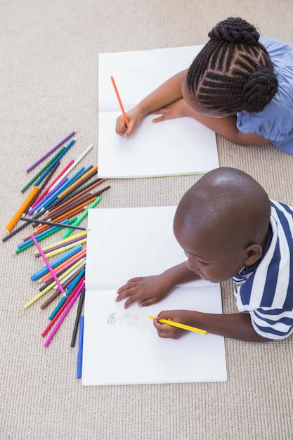 Siblings on the floor drawing 