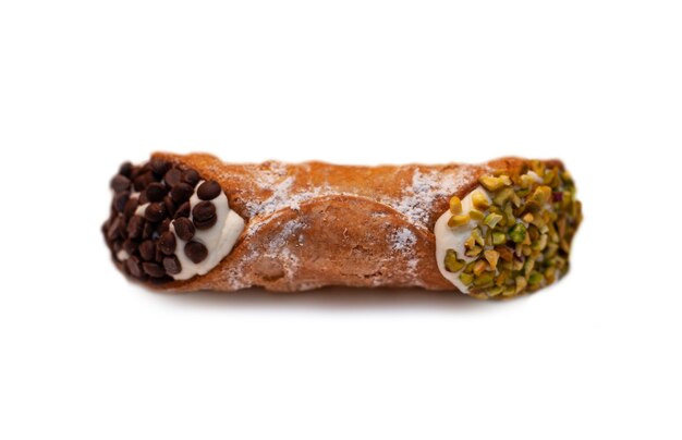 Sicilian cannolo with ricotta, chocolate and chopped pistachios