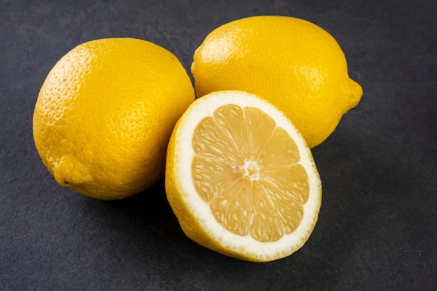 Sicilian lemons on slate stone.