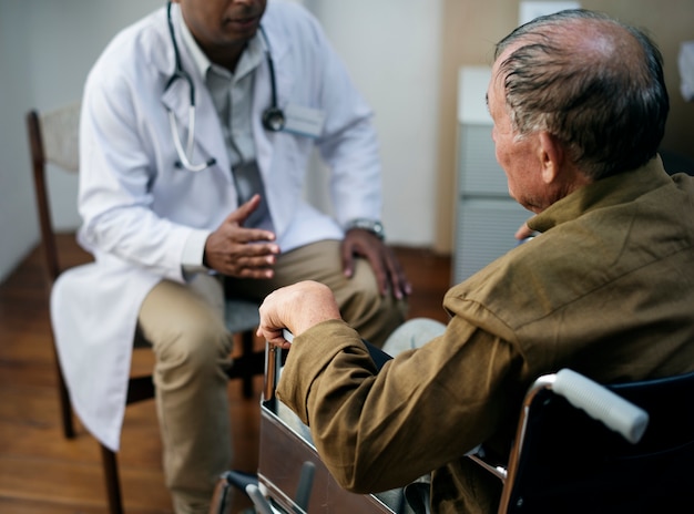 A sick elderly is staying at a hospital