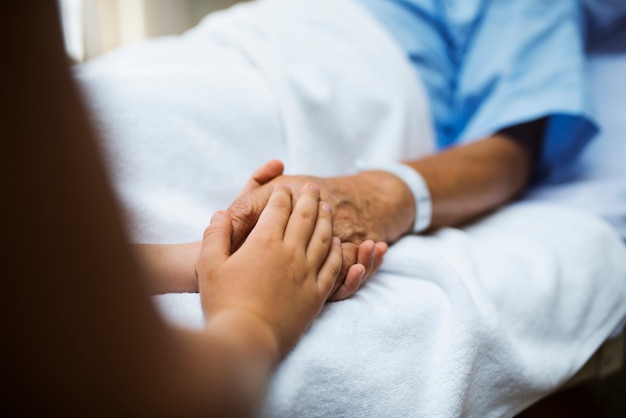 A sick elderly staying at a hospital