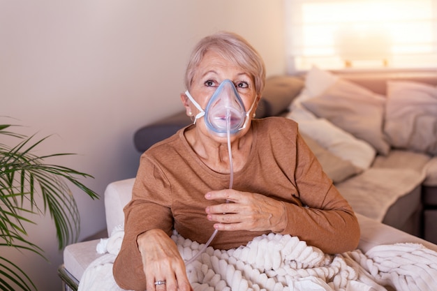 Sick elderly woman making inhalation, medicine is the best\
medicine.