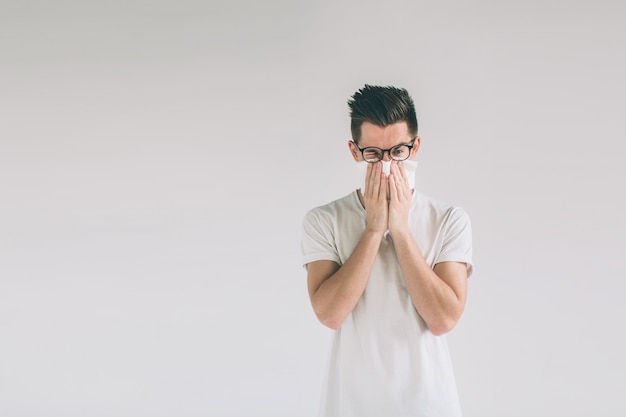 Sick guy isolated has runny nose