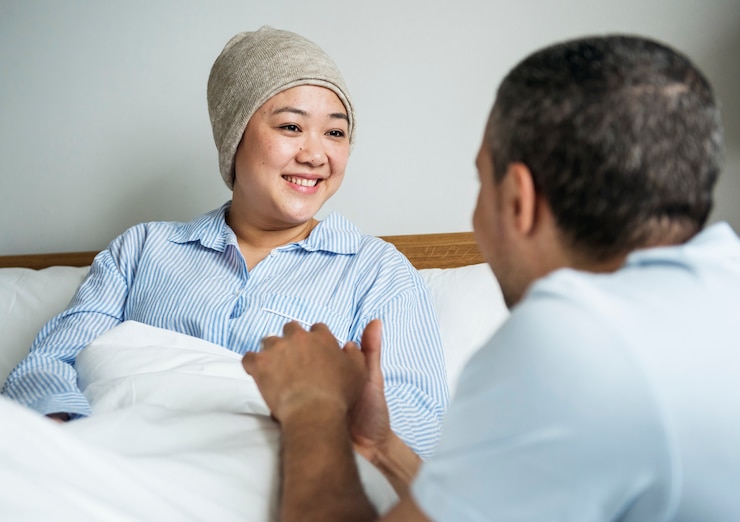 Photo a sick woman in bed with her partner