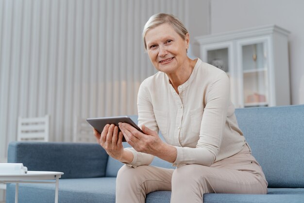 Sick woman consulting a doctor by video link.