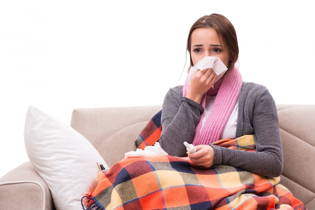 Sick woman lying on the sofa