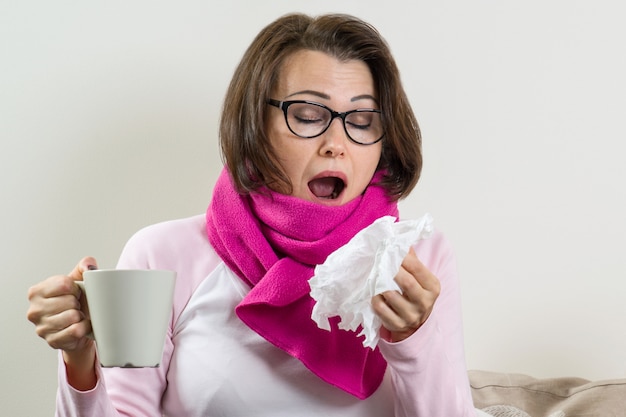 sick woman with handkerchief