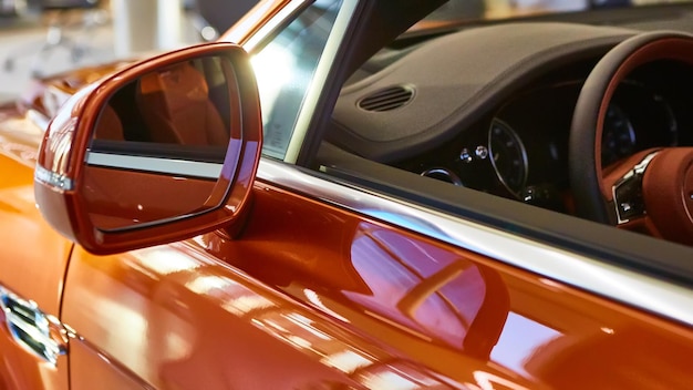 Side rear-view mirror on a modern car.