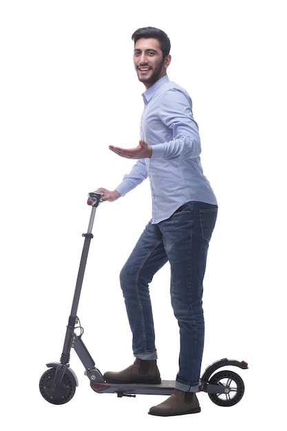 Side view attractive young man with an electric scooter