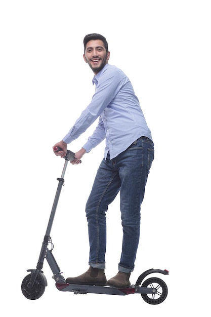 Side view attractive young man with an electric scooter