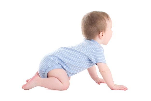 Side view baby boy toddler crawling isolated on white background