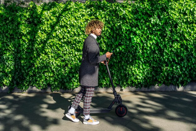 Side view of boy riding bicycle