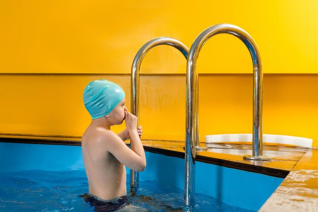 Side view of boy in swimming pool