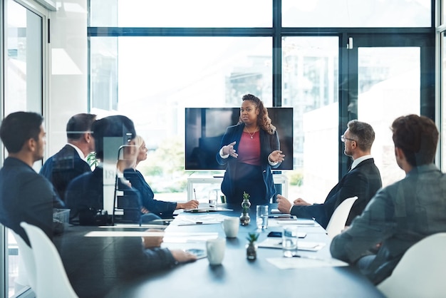 Side view of business colleagues working at office