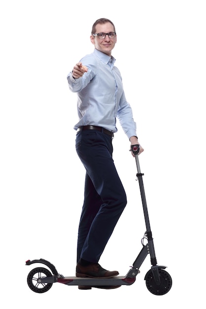 side view casual man with electric scooter looking at you isolated on a white