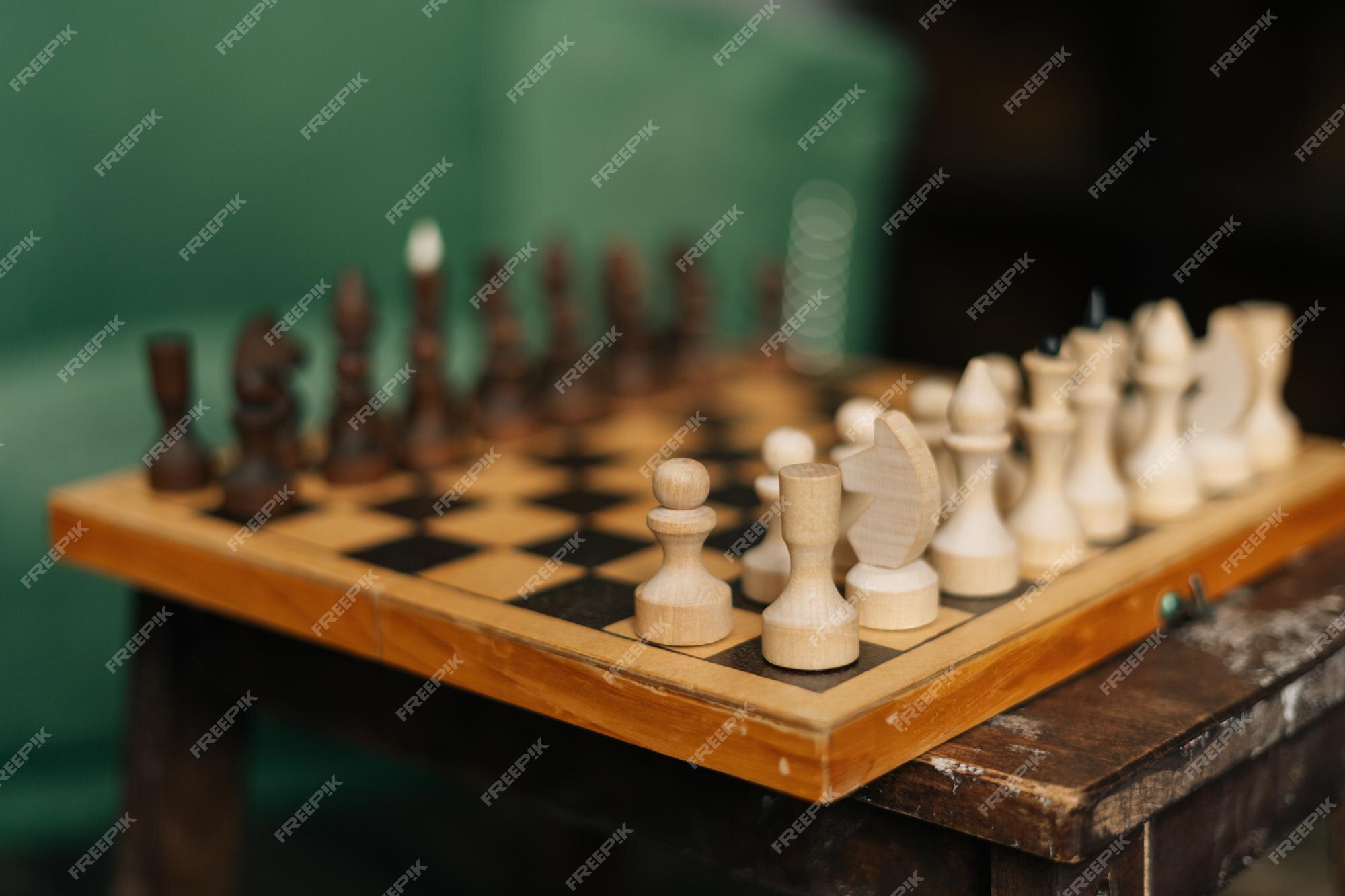 Browse Free HD Images of Chess Pieces In Focus On A Wooden Chess Board