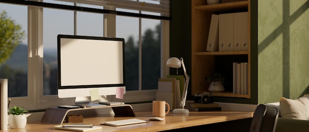 Side view Comfortable home office workspace with computer mockup on table against the window