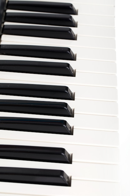 Side view of electronic piano keyboard keys