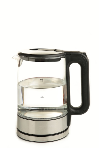 Side view of glass electric kettle with water isolated on white