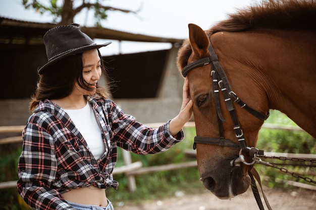 Side view of horse standing against sky