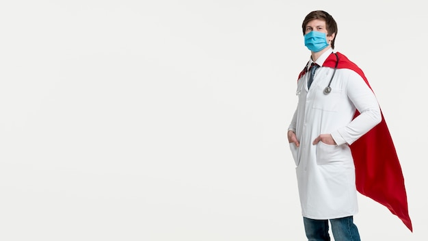 Side view man wearing surgical mask