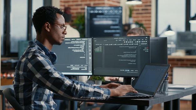 Side view of man working at office