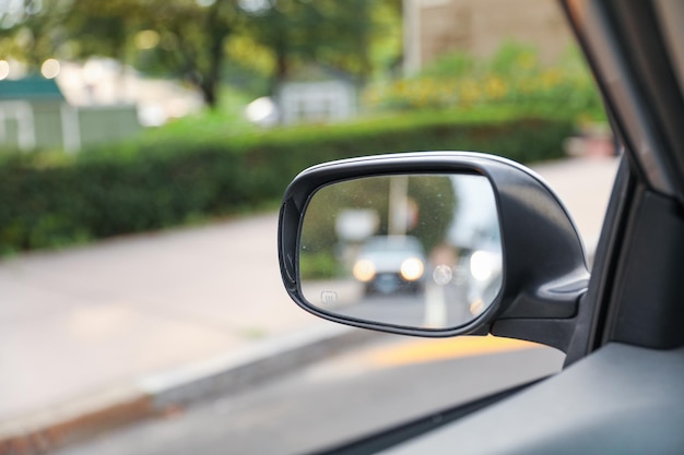 A side view mirror that says " the side view ".