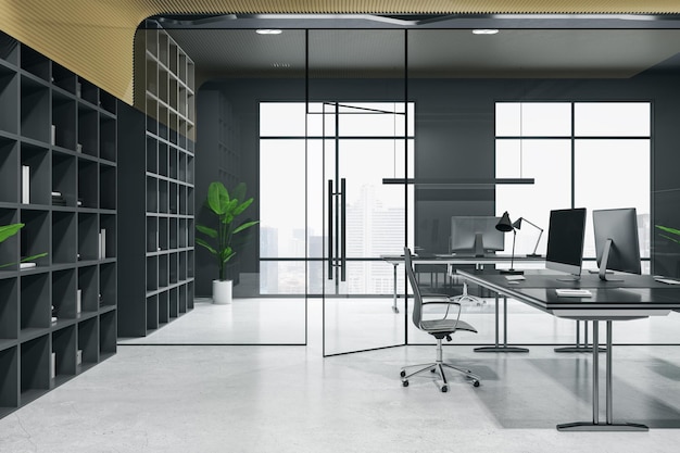 검은색 벽과 가구 현대적인 컴퓨터가 있는 현대적인 넓은 공동 작업 사무실의 측면 전망은 영역 3D 렌더링 사이에 콘크리트 바닥과 유리 문을 밝게 합니다.