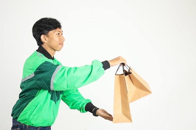 Side View Online Driver Delivering Package on Paper Bag