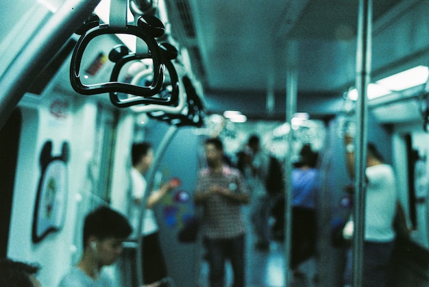 side view of people traveling in train
