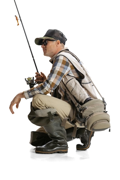 Side view portrait of man doing fishing activity isolated over white background