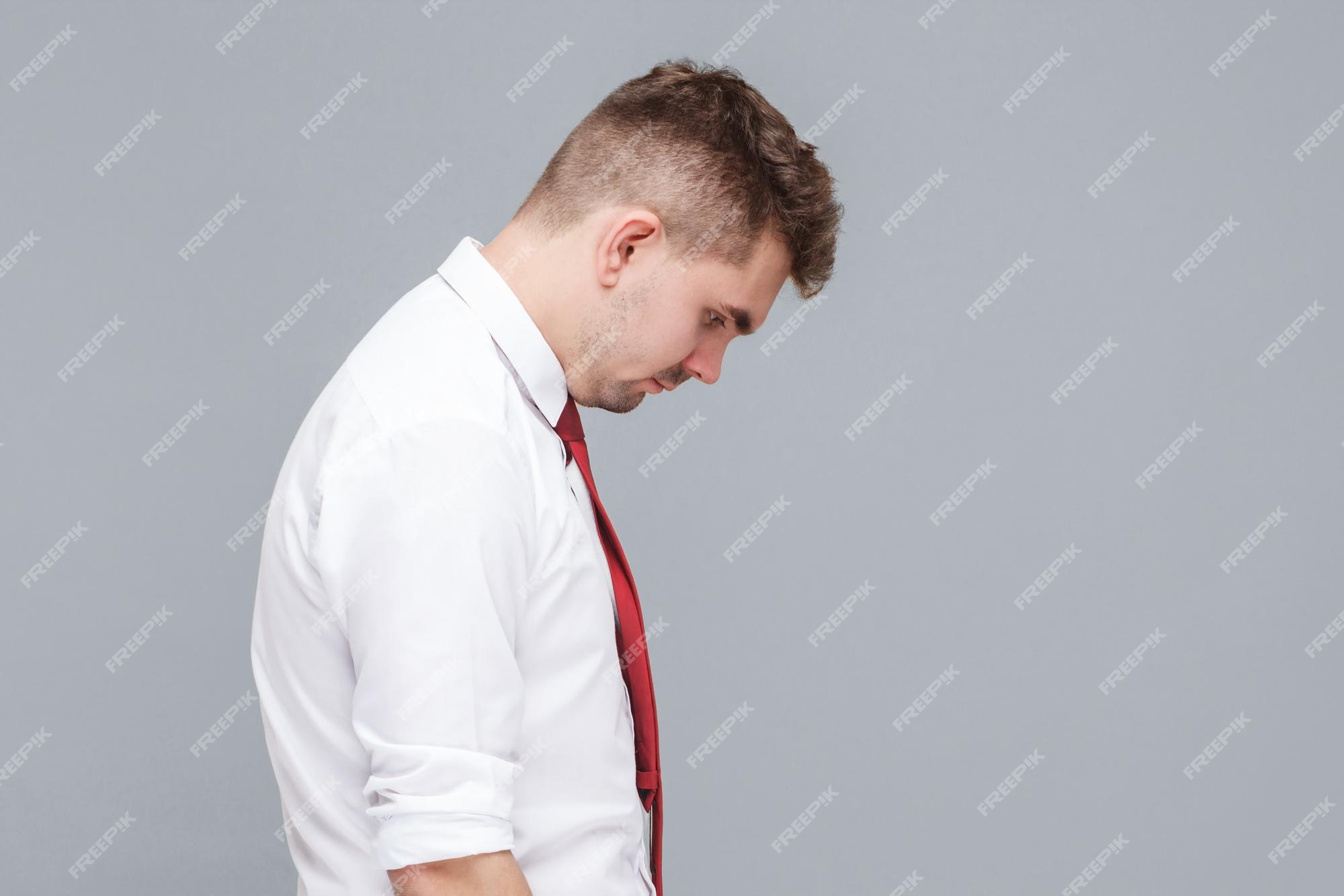 Profile View Of Serious Young Man Over White Background Stock Photo -  Download Image Now - iStock