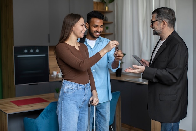 Side view smiley host talking to guests