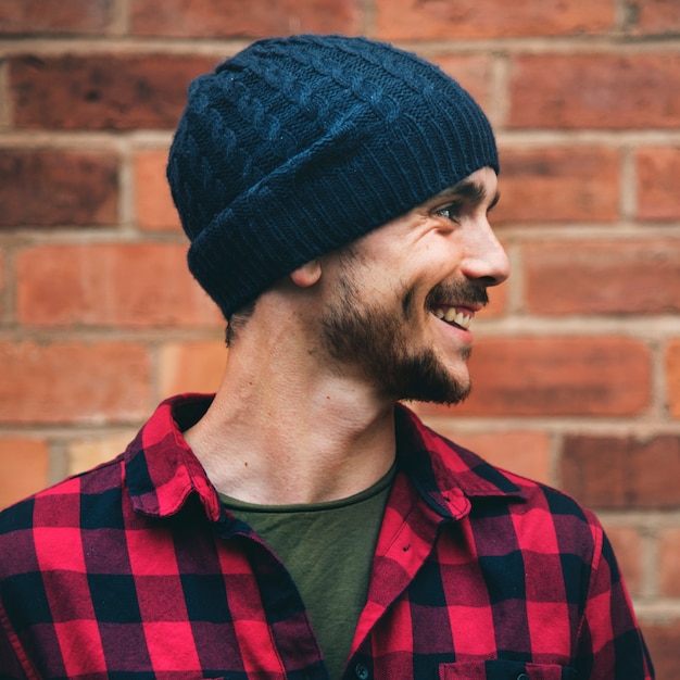 Side view of smiling beard man