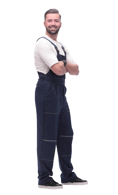 Side view smiling man in overalls looking forward to copy space