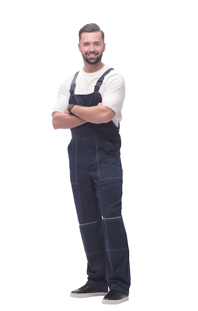 Side view smiling man in overalls looking forward to copy space