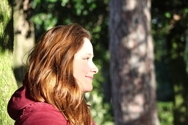 Side view of smiling woman