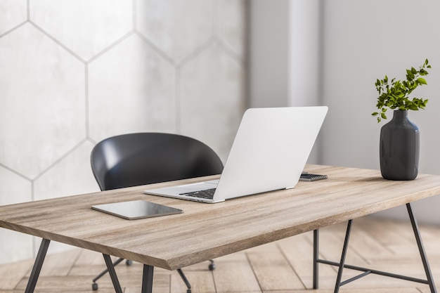 Photo side view on sunny stylish home workspace with eco interior design laptop and digital tablet on wooden table tree branch in glossy clay pot and light parquet floor 3d rendering