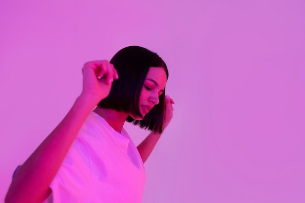 side view woman dancing in studio