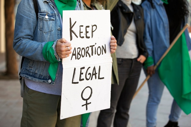 Side view women protesting outdoors