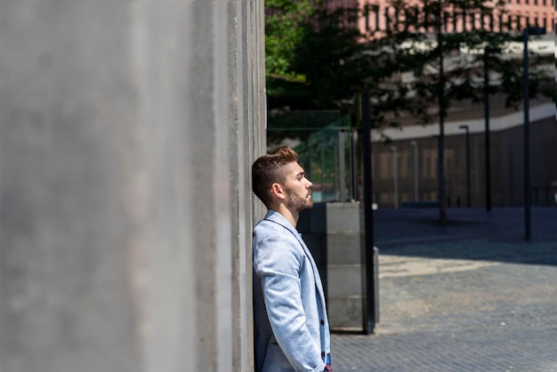 Side view of young man looking away