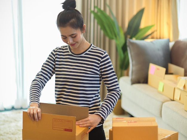 Side view of young man working at home