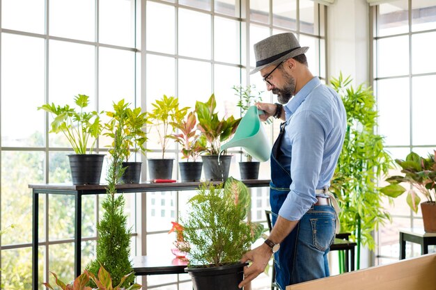 Side view of young man working at home