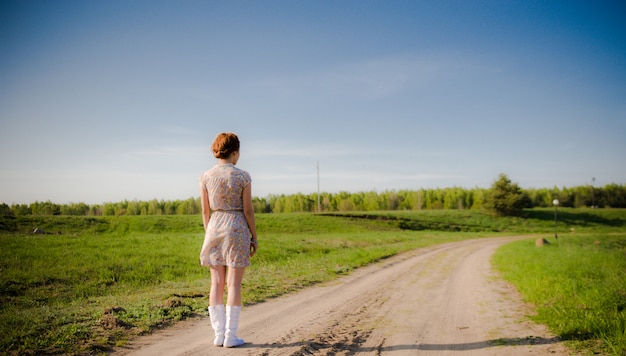 Side view young woman. Frustrated embarrassed woman feels unhappy problem in her personal life, concept of a girl and loneliness.