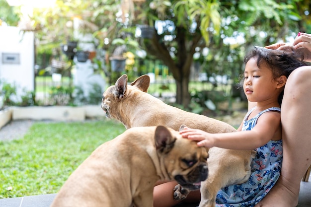 Side view of young woman with dog