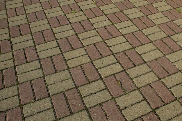 Тротуар текстурированный фон. Деталь тротуара