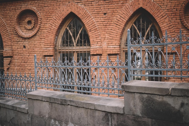 Sidewalk and vintage brick fence