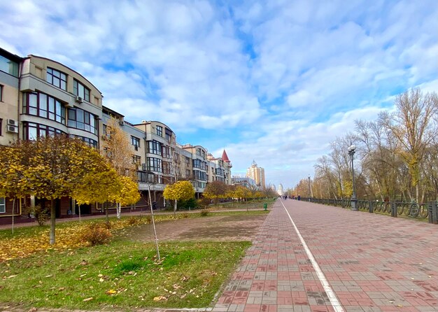 A sidewalk with a building on it