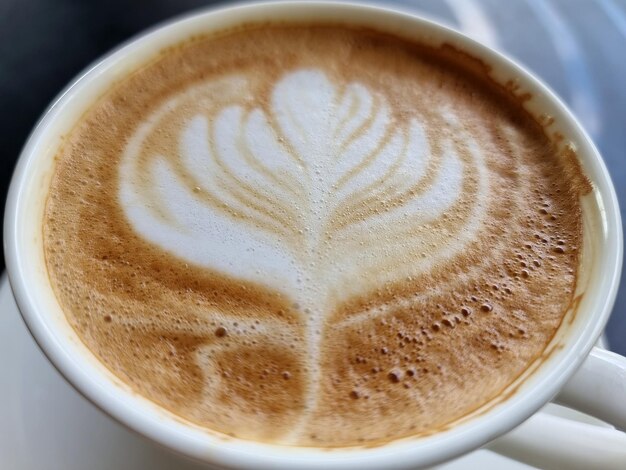 Sideway shop coffee closeup hot latte art coffee background